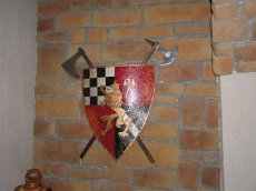 Кованное настенное пано щит и два топора