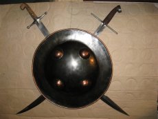 Настенное кованное пано щит и два меча